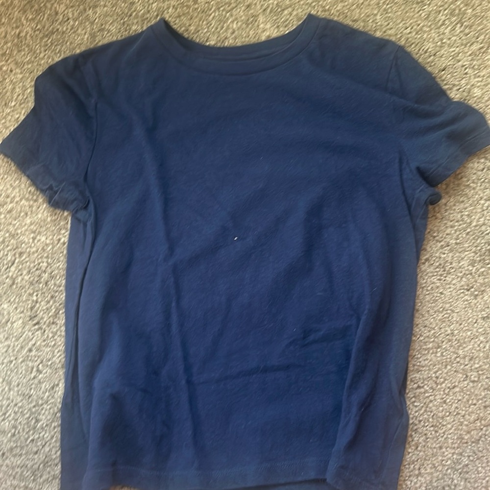 It is navy blue basic shirt